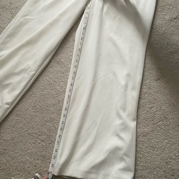 David’s Bridal off-the-shoulder floral puff sleeve jumpsuit - Picture 12 of 14